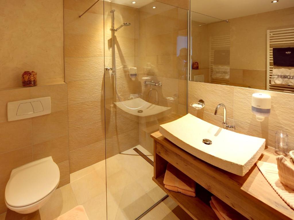 Koupelna v ubytování Hotel Röck Garni