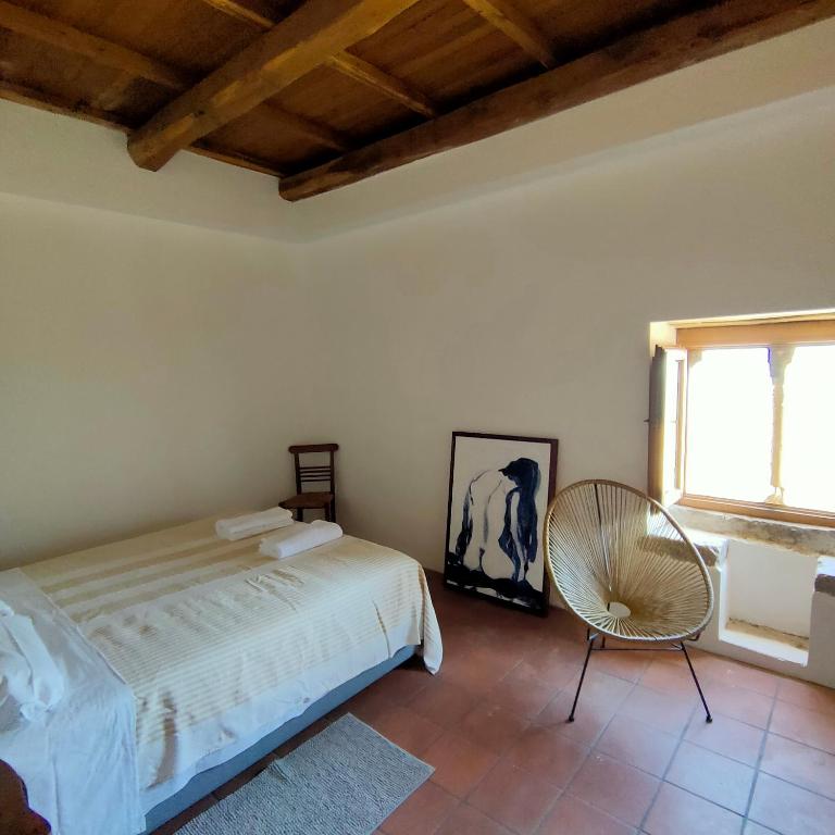 Postel nebo postele na pokoji v ubytování IL BORGO DI ROCCA CALASCIO