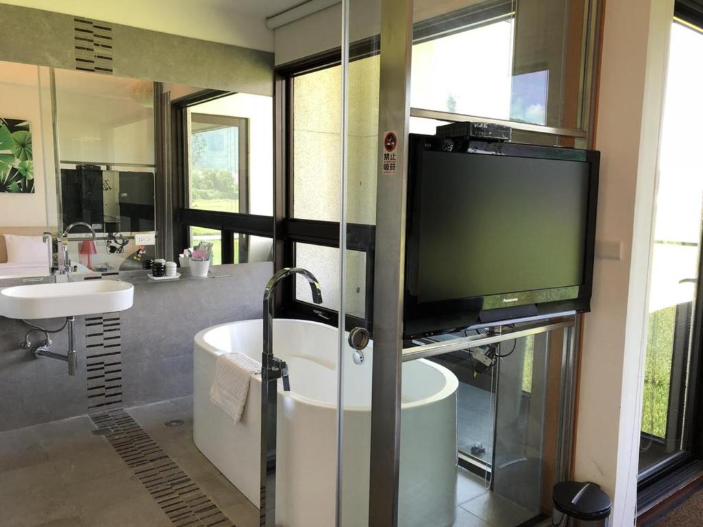 TV a/nebo společenská místnost v ubytování Aqua Star Villa Homestay