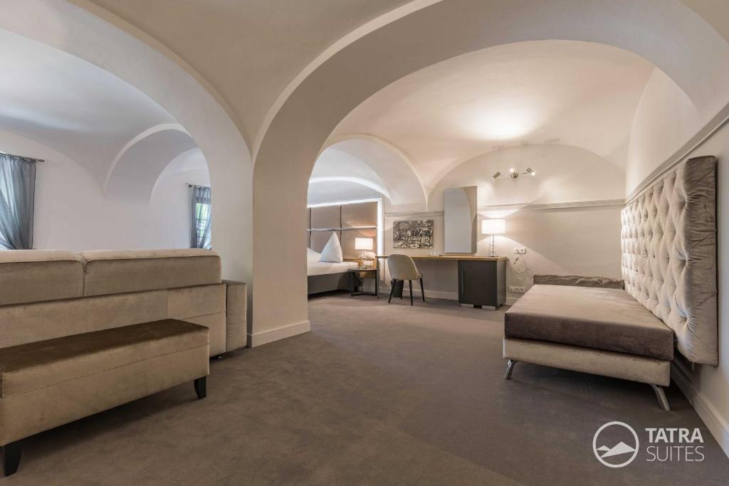 Posteľ alebo postele v izbe v ubytovaní TATRA SUITES Boutique Suites Deforte Elegance 201