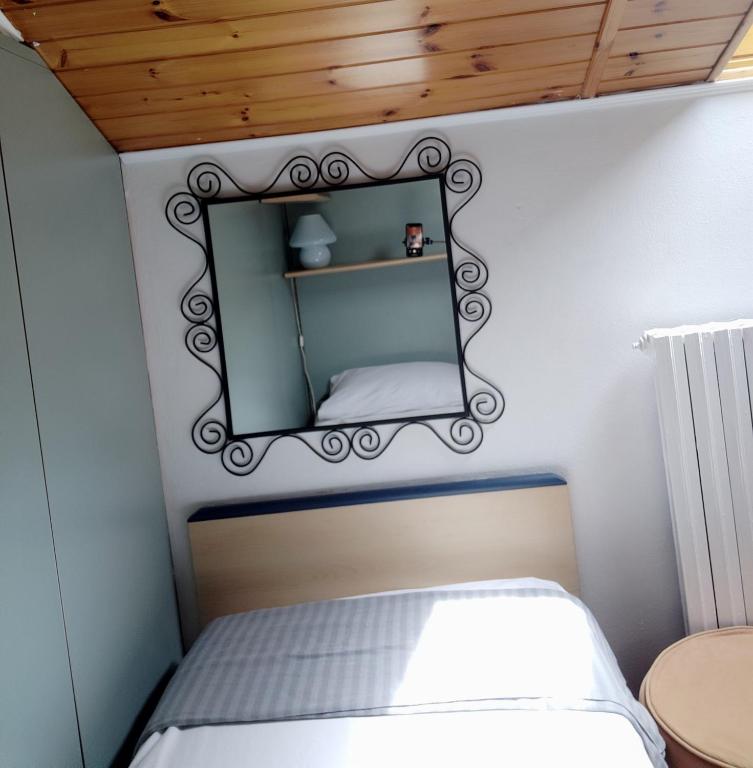 A bed or beds in a room at B&B La Casetta