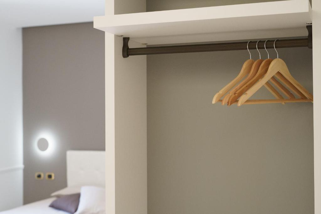Postel nebo postele na pokoji v ubytování Caffetteria Luca Suite & Rooms