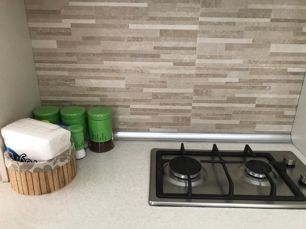 Kuchyň nebo kuchyňský kout v ubytování City Center Apartment