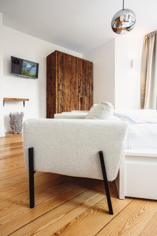 Postel nebo postele na pokoji v ubytování DAS STRANDGLÜCK - Villa und Mee(h)r
