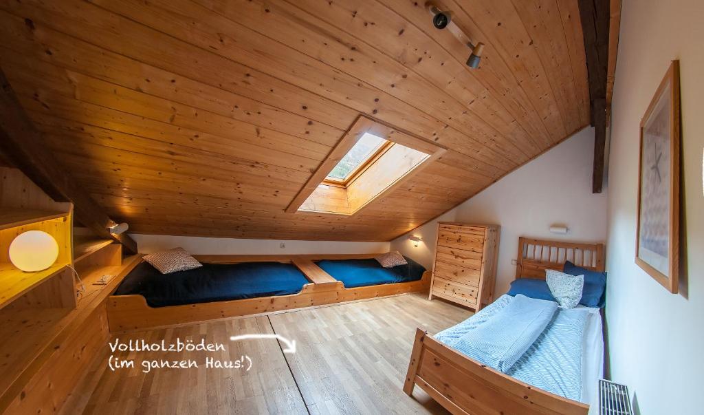 Posteľ alebo postele v izbe v ubytovaní Gabis Lodge