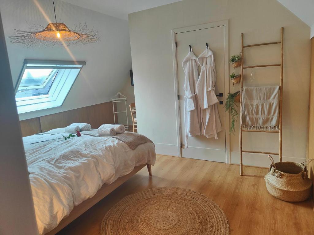 Postel nebo postele na pokoji v ubytování Le duplex d'Albert logement d'exception à Namur