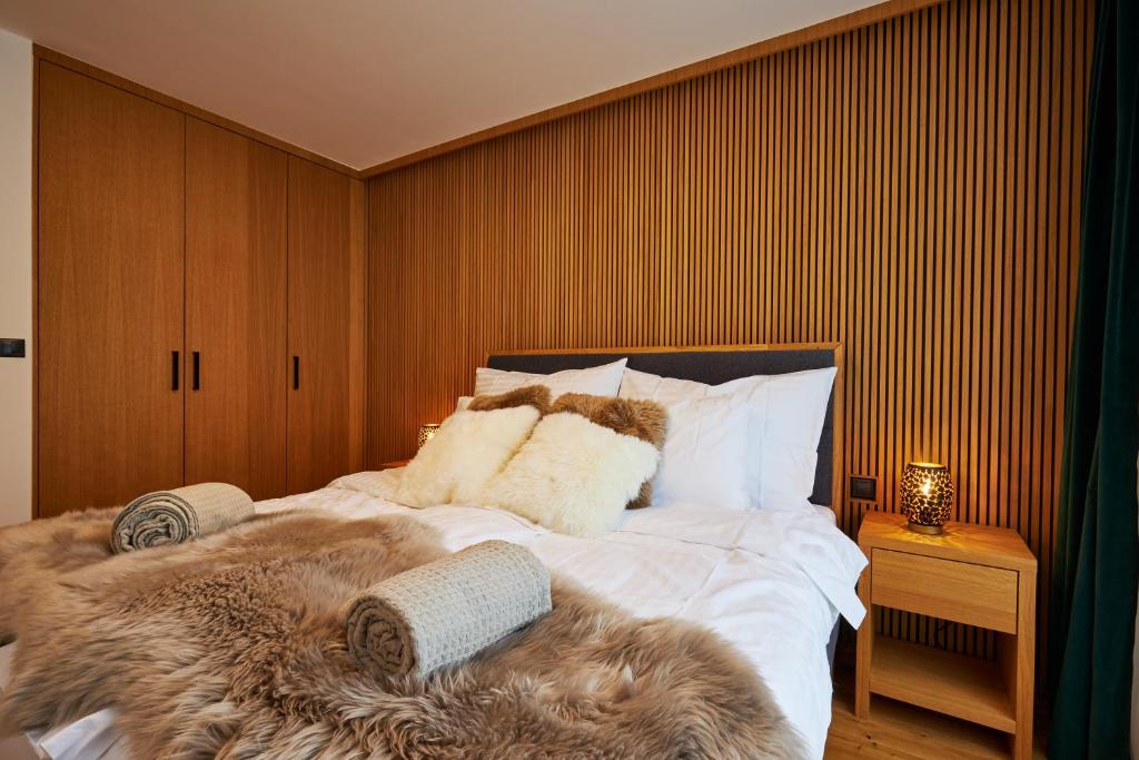 A bed or beds in a room at RV Apartment Olivine