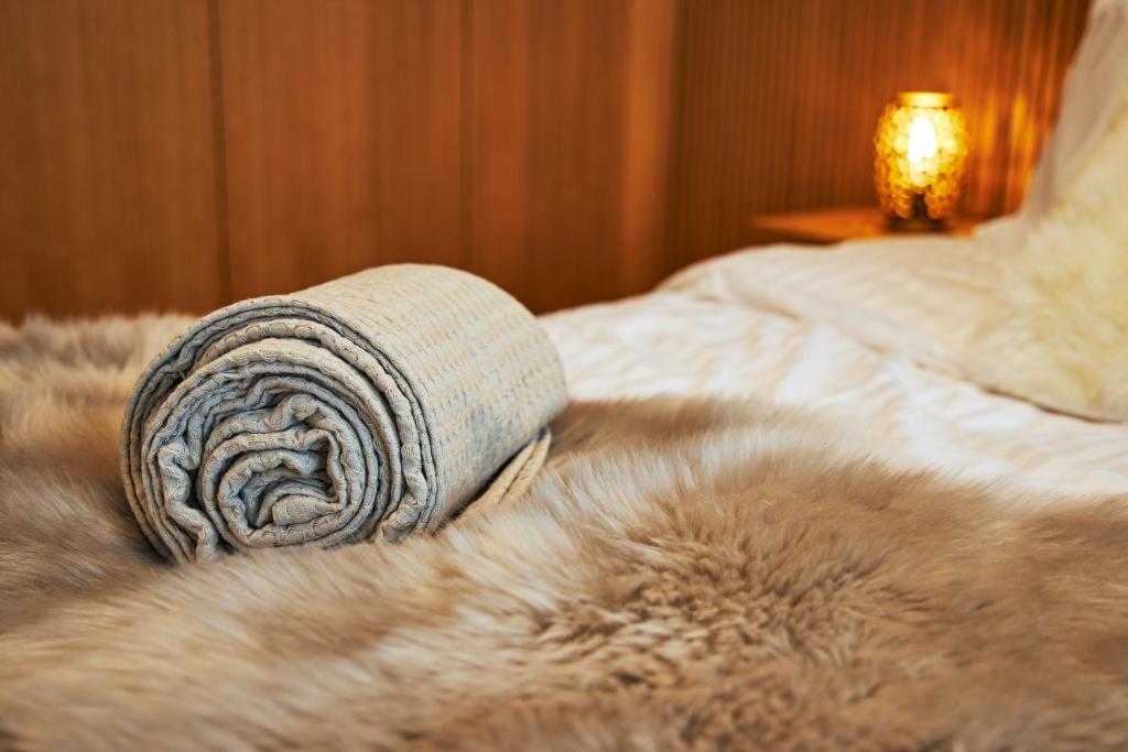 A bed or beds in a room at RV Apartment Olivine