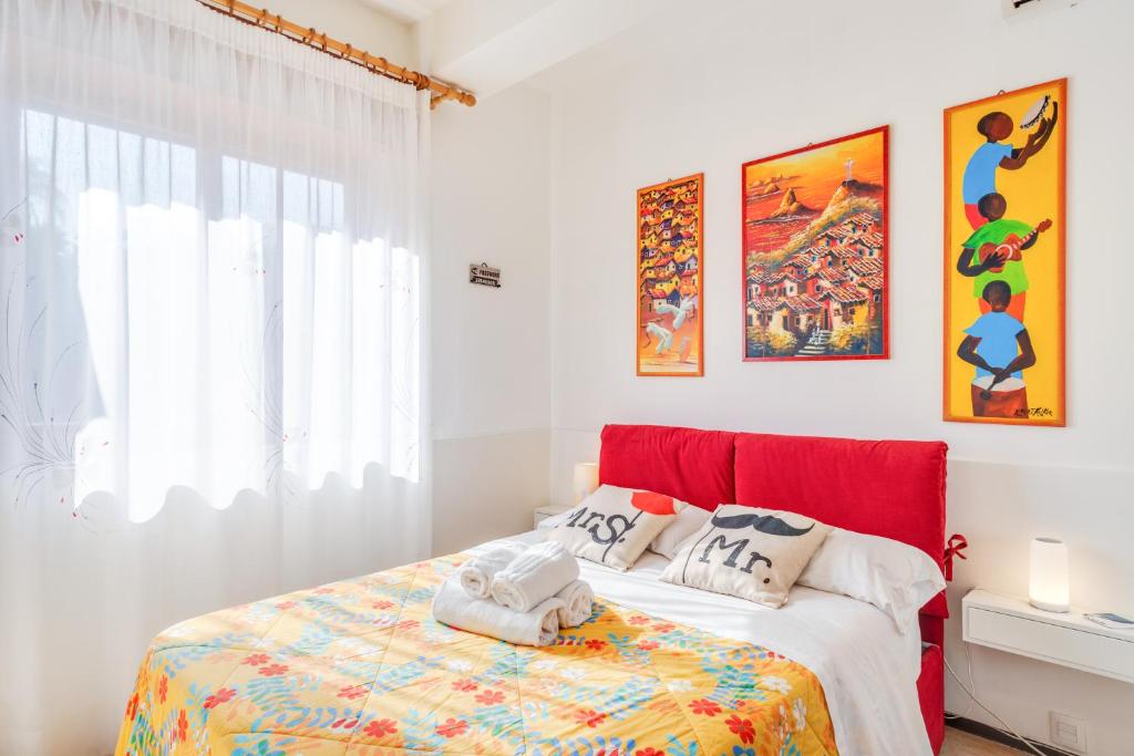 A bed or beds in a room at Casa Scogliera