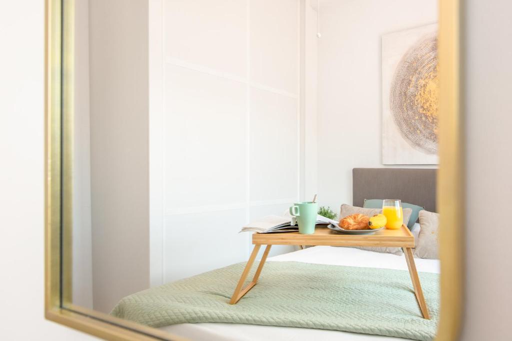 Televízia a/alebo spoločenská miestnosť v ubytovaní Suite Homes Penthouse La Merced