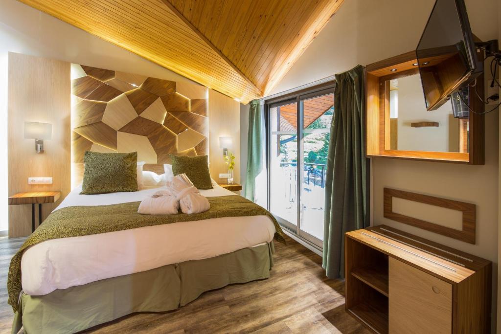 Postel nebo postele na pokoji v ubytování Hotel Princesa Parc