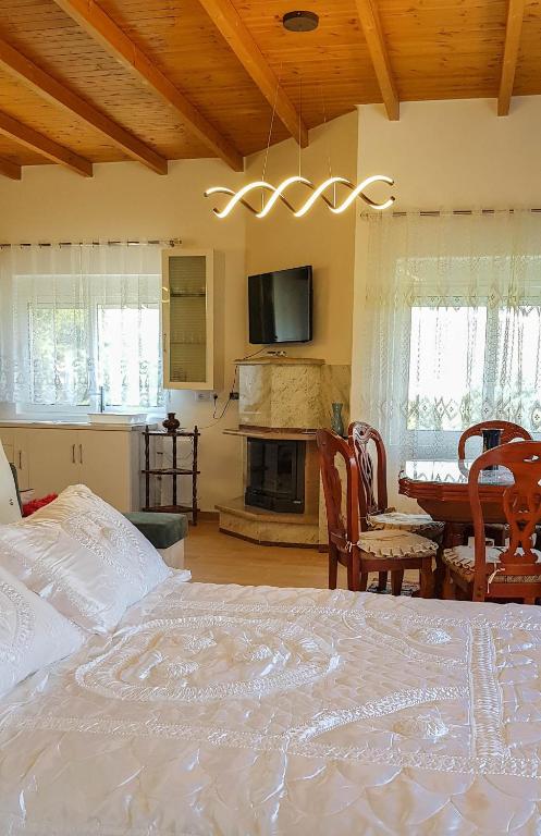 Postel nebo postele na pokoji v ubytování Villa Goliku