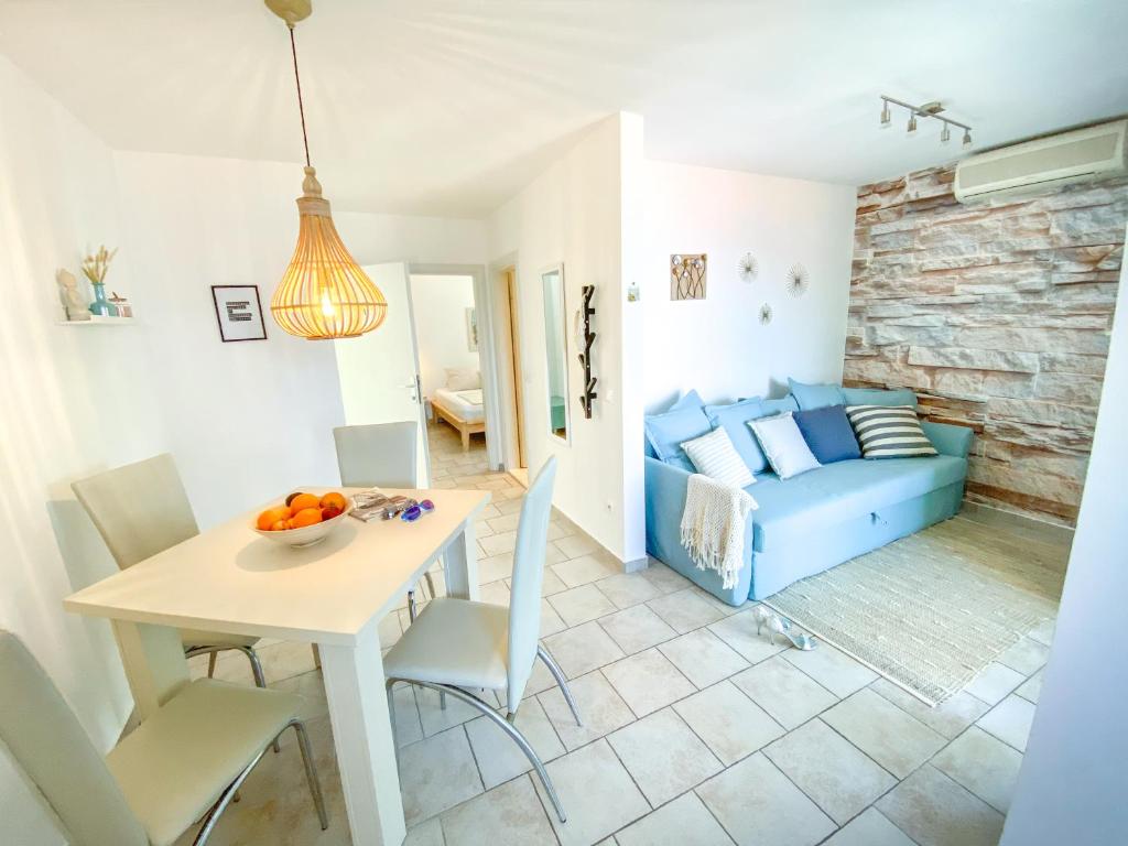 Гостиная зона в Eco Sunshine Apartments Lumbarda