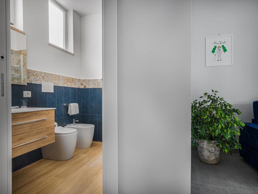 Kúpeľňa v ubytovaní Azzurro Park Suite - De Vivo Realty Sorrento
