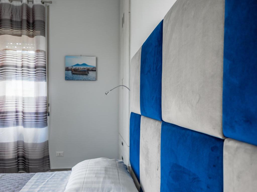 Posteľ alebo postele v izbe v ubytovaní Azzurro Park Suite - De Vivo Realty Sorrento