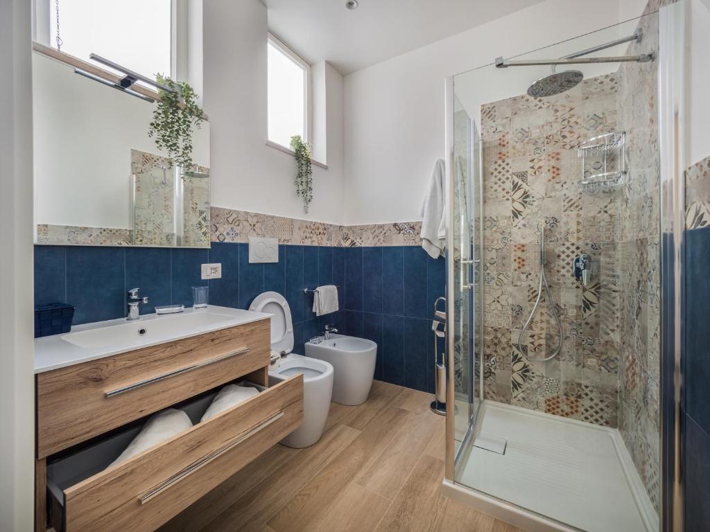 Kúpeľňa v ubytovaní Azzurro Park Suite - De Vivo Realty Sorrento