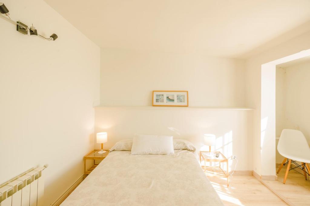 Postel nebo postele na pokoji v ubytování CASA LAS OLAS DE LANGRE