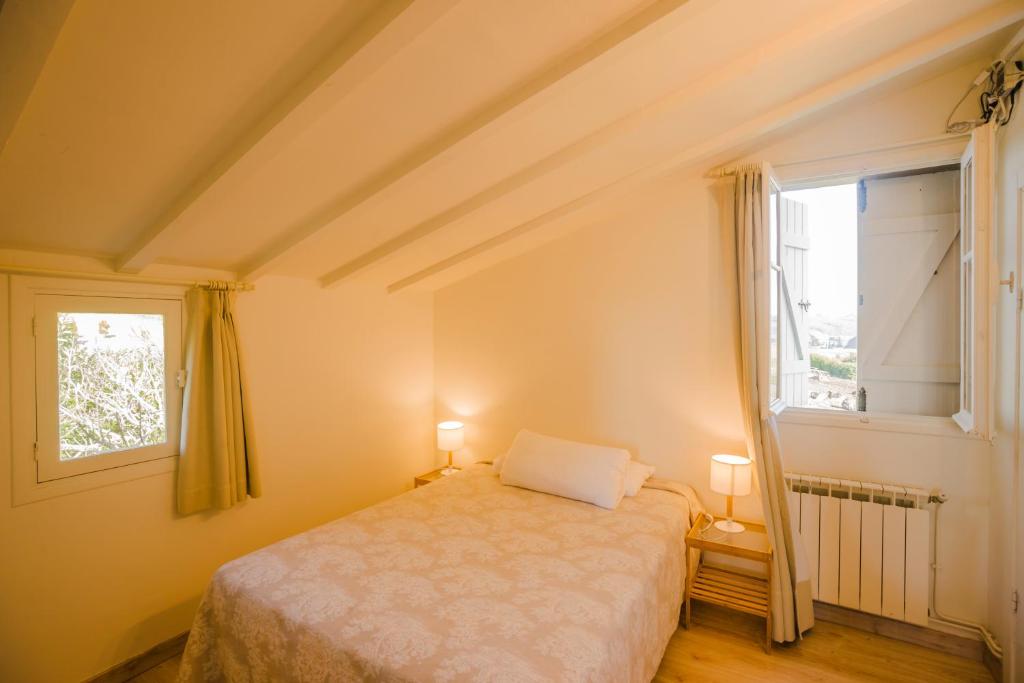 Postel nebo postele na pokoji v ubytování CASA LAS OLAS DE LANGRE
