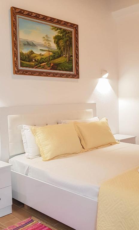 Postel nebo postele na pokoji v ubytování Villa Goliku
