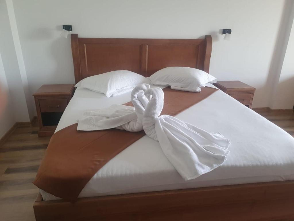 Postel nebo postele na pokoji v ubytování Casa Vlad