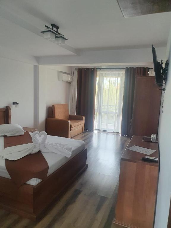 Postel nebo postele na pokoji v ubytování Casa Vlad