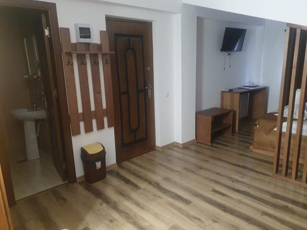 TV a/nebo společenská místnost v ubytování Casa Vlad