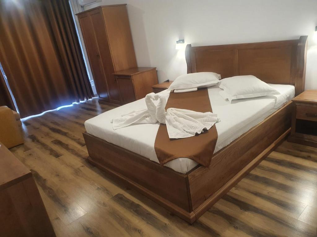 Postel nebo postele na pokoji v ubytování Casa Vlad