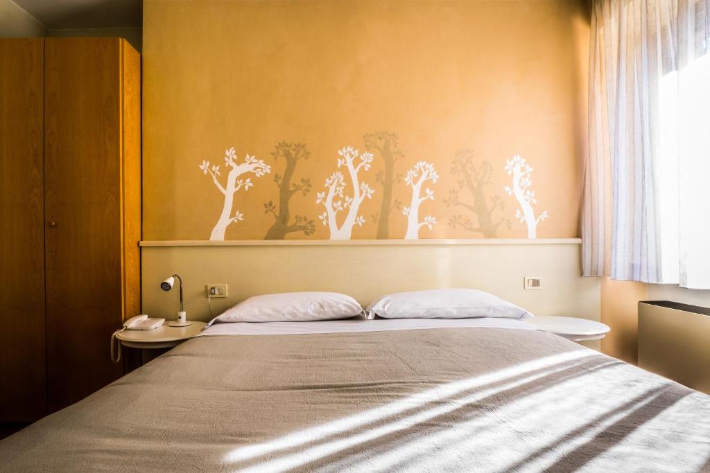 Postel nebo postele na pokoji v ubytování Al Vecchio Palazzo