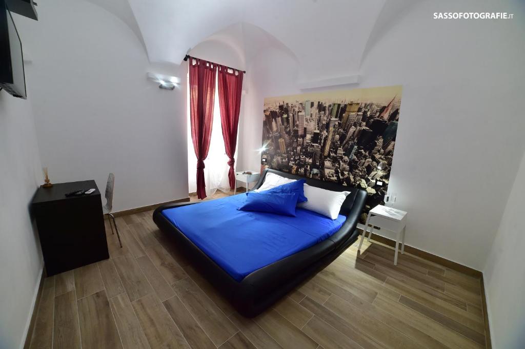 Postel nebo postele na pokoji v ubytování Suite Varigotti