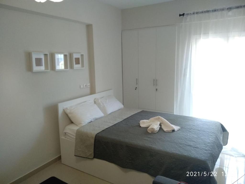 Łóżko lub łóżka w pokoju w obiekcie Little Beauty - HappyHostGr - in Platamonas