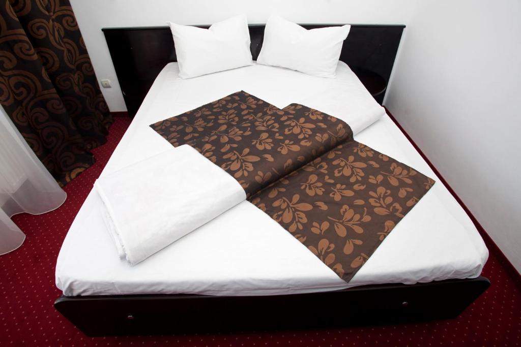 Postel nebo postele na pokoji v ubytování Hotel Terra