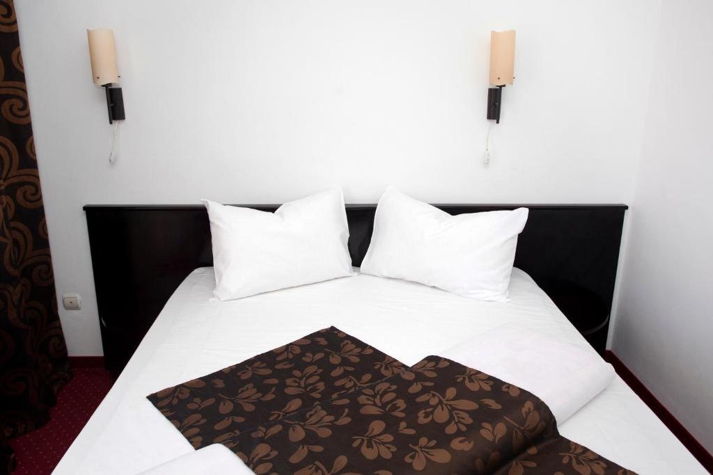 Postel nebo postele na pokoji v ubytování Hotel Terra
