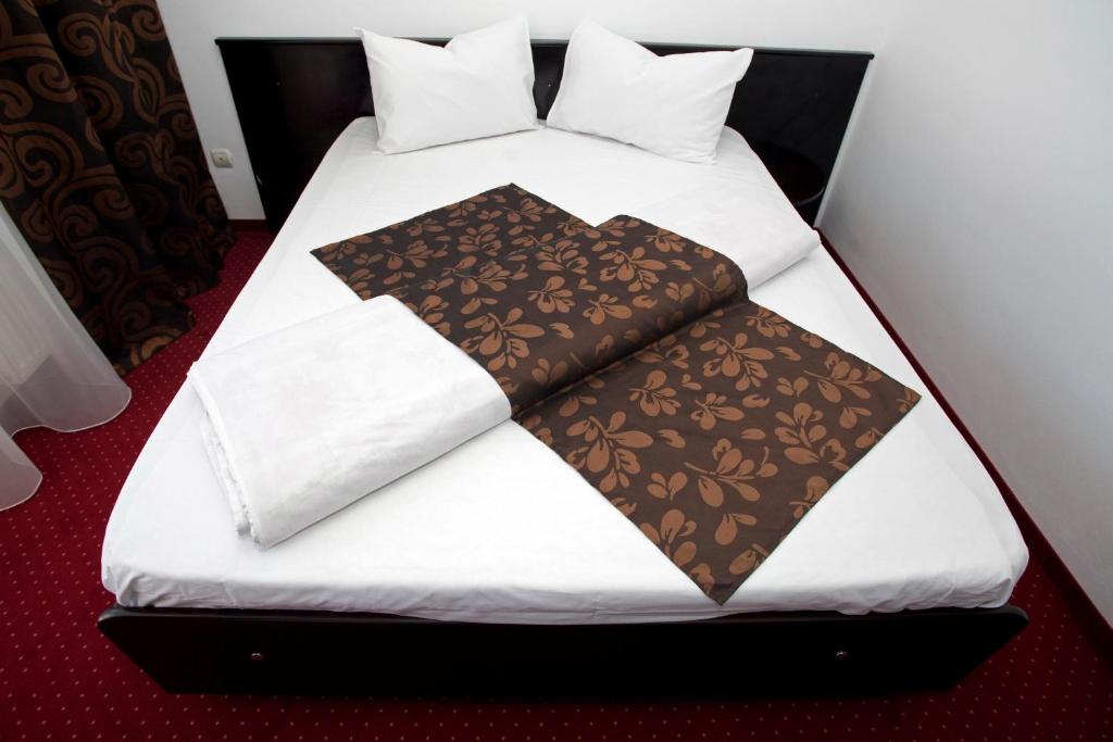 Postel nebo postele na pokoji v ubytování Hotel Terra