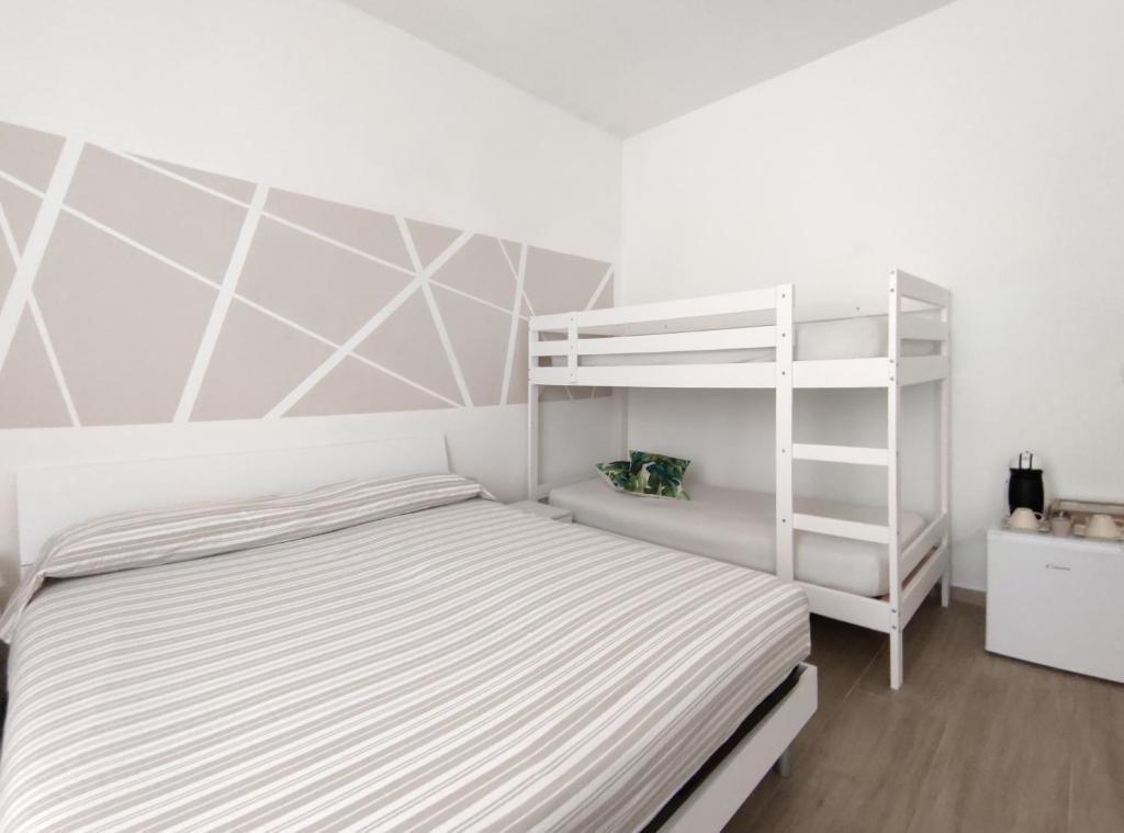 Postel nebo postele na pokoji v ubytování B&B CABIROL