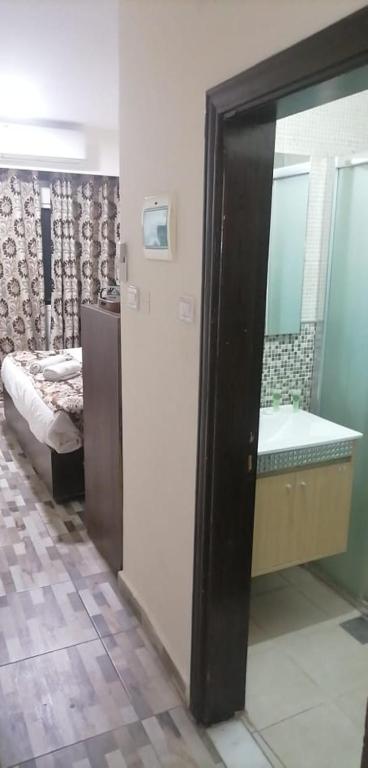 Postel nebo postele na pokoji v ubytování Darak hotel