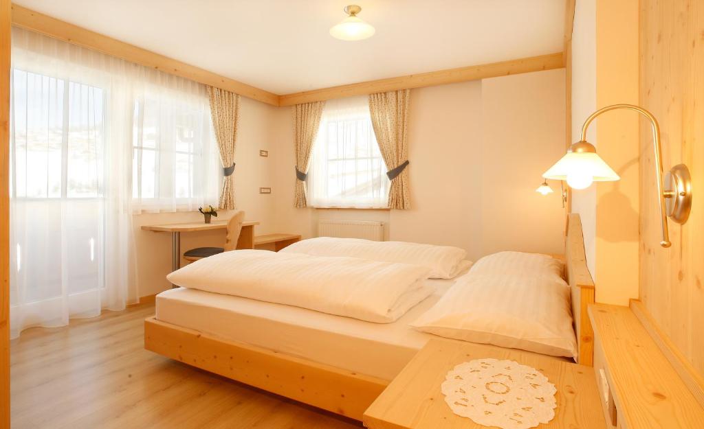 Łóżko lub łóżka w pokoju w obiekcie Apartments Antines