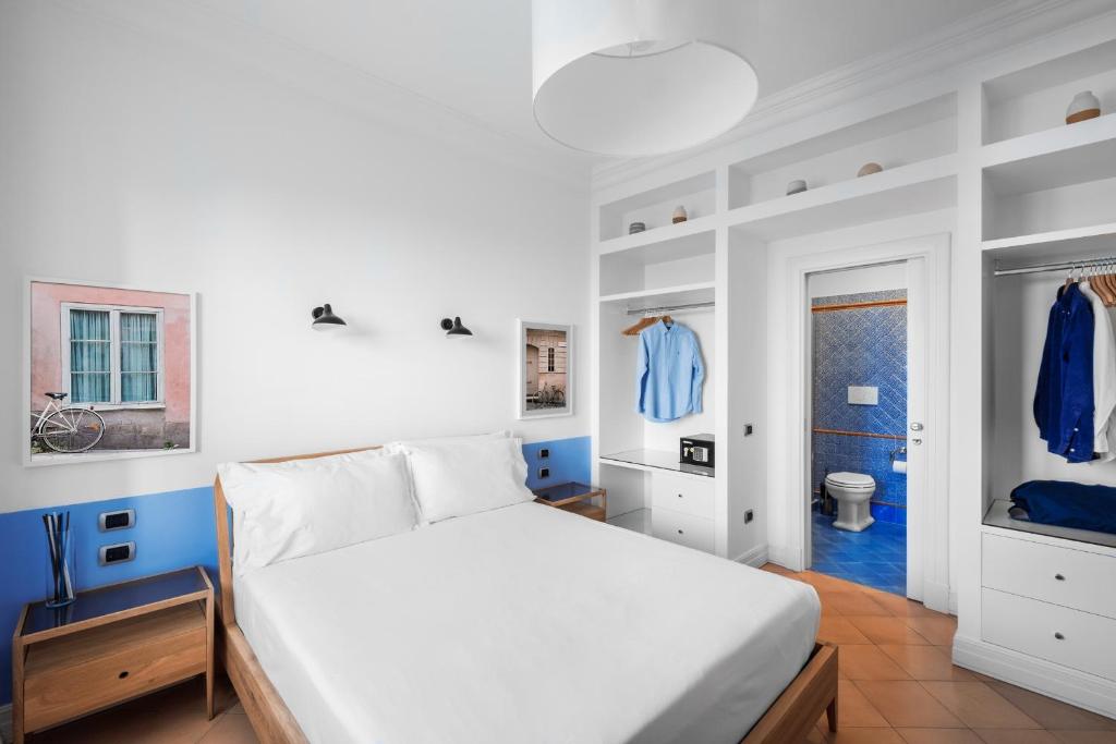 Postel nebo postele na pokoji v ubytování Sorrento & Else - Deluxe Apartments
