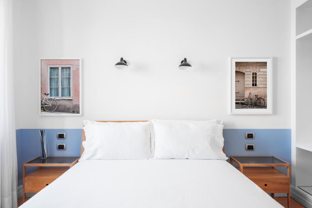 Postel nebo postele na pokoji v ubytování Sorrento & Else - Deluxe Apartments