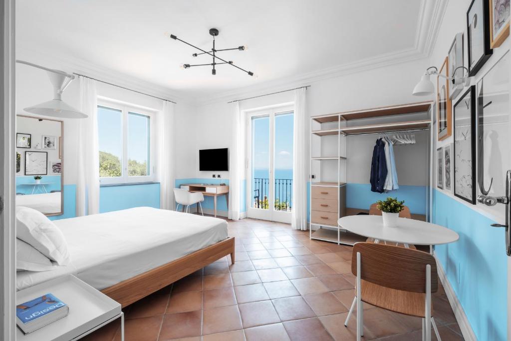 Postel nebo postele na pokoji v ubytování Sorrento & Else - Deluxe Apartments