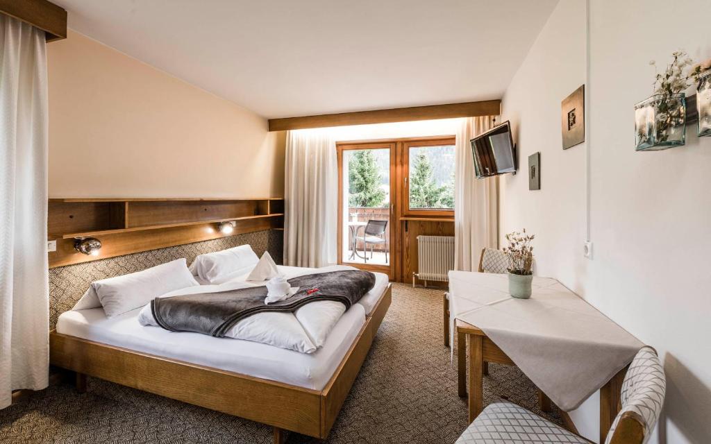 Postel nebo postele na pokoji v ubytování Raschötzhof