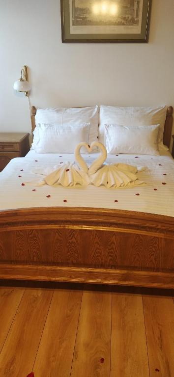 Postel nebo postele na pokoji v ubytování Hotel Šumava