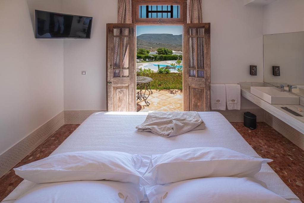 A bed or beds in a room at Finca Maltes San José