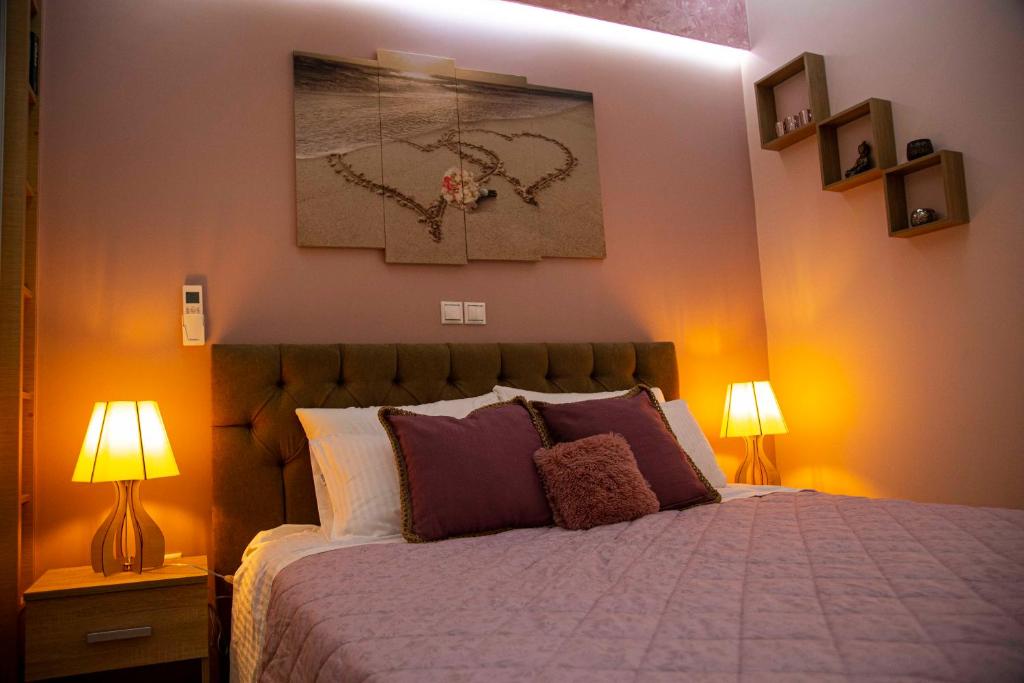 Postel nebo postele na pokoji v ubytování Athens Nautical Flat