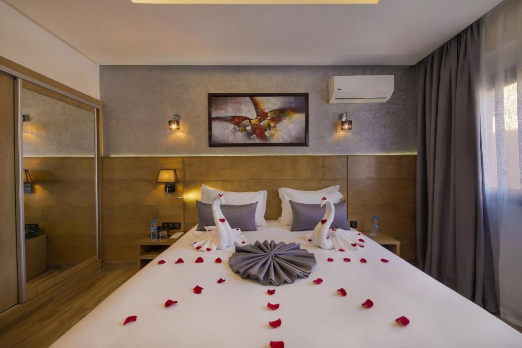 Postel nebo postele na pokoji v ubytování Stars Hotel & Spa