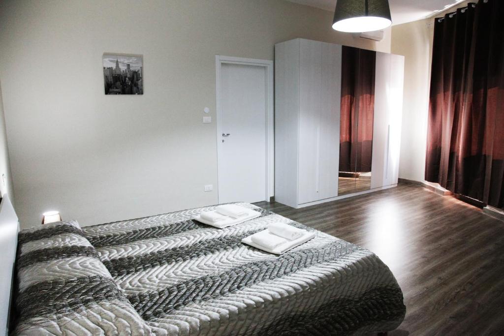 A bed or beds in a room at Affittacamere Sogni D'oro