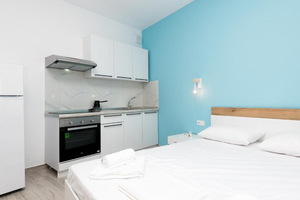 Kuchyň nebo kuchyňský kout v ubytování Diamanti Apartments Downtown Limenas Thasos
