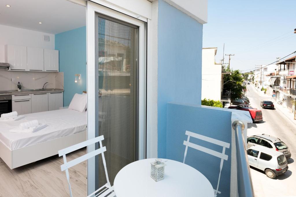 Postel nebo postele na pokoji v ubytování Diamanti Apartments Downtown Limenas Thasos