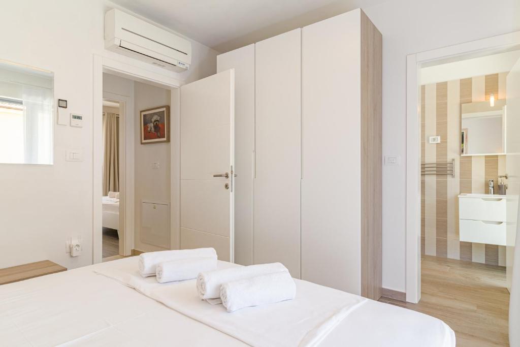 Postel nebo postele na pokoji v ubytování Apartments Anna Liznjan