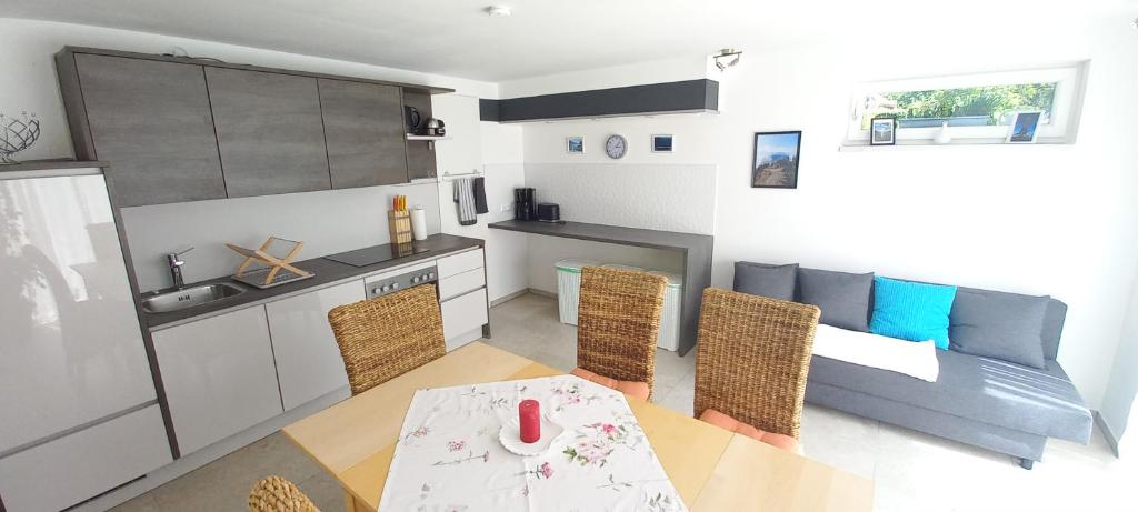 A kitchen or kitchenette at Apartment SeeYou