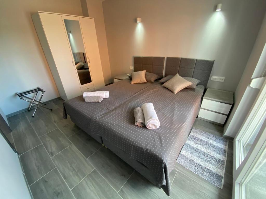 Postel nebo postele na pokoji v ubytování Villa Maleo